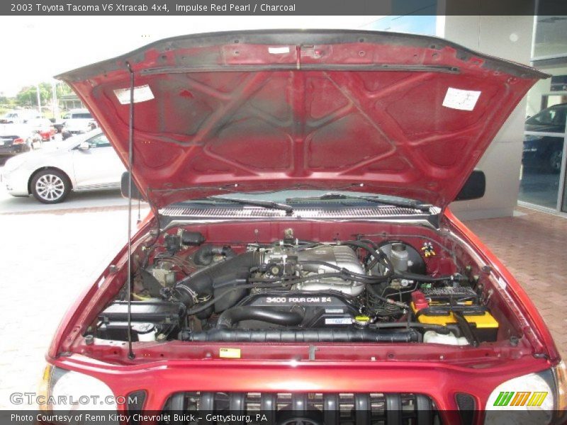 Impulse Red Pearl / Charcoal 2003 Toyota Tacoma V6 Xtracab 4x4