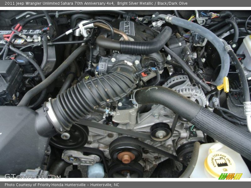 Bright Silver Metallic / Black/Dark Olive 2011 Jeep Wrangler Unlimited Sahara 70th Anniversary 4x4