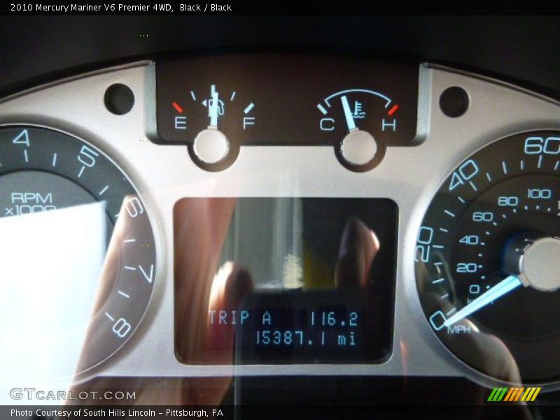 Black / Black 2010 Mercury Mariner V6 Premier 4WD