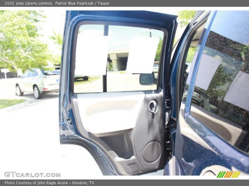 Patriot Blue Pearlcoat / Taupe 2002 Jeep Liberty Limited