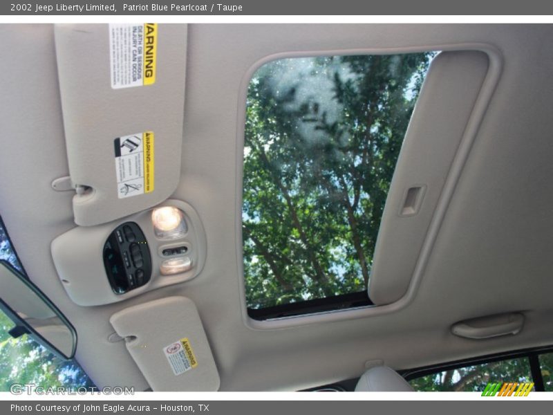 Patriot Blue Pearlcoat / Taupe 2002 Jeep Liberty Limited