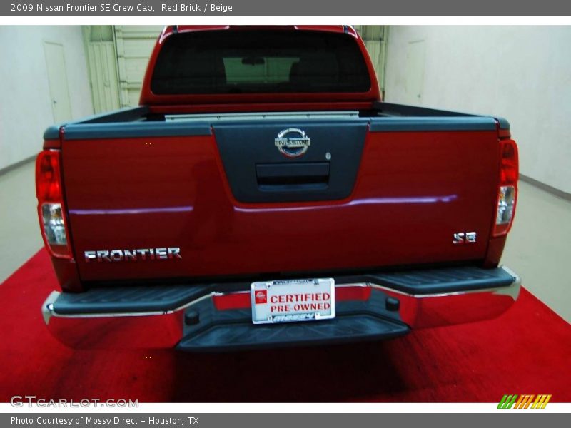 Red Brick / Beige 2009 Nissan Frontier SE Crew Cab
