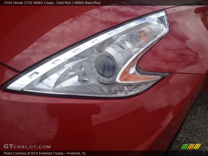 Solid Red / NISMO Black/Red 2009 Nissan 370Z NISMO Coupe