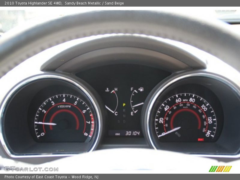 Sandy Beach Metallic / Sand Beige 2010 Toyota Highlander SE 4WD
