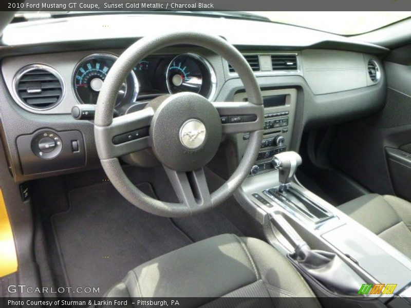 Sunset Gold Metallic / Charcoal Black 2010 Ford Mustang GT Coupe