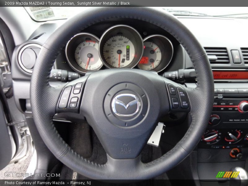 Sunlight Silver Metallic / Black 2009 Mazda MAZDA3 i Touring Sedan