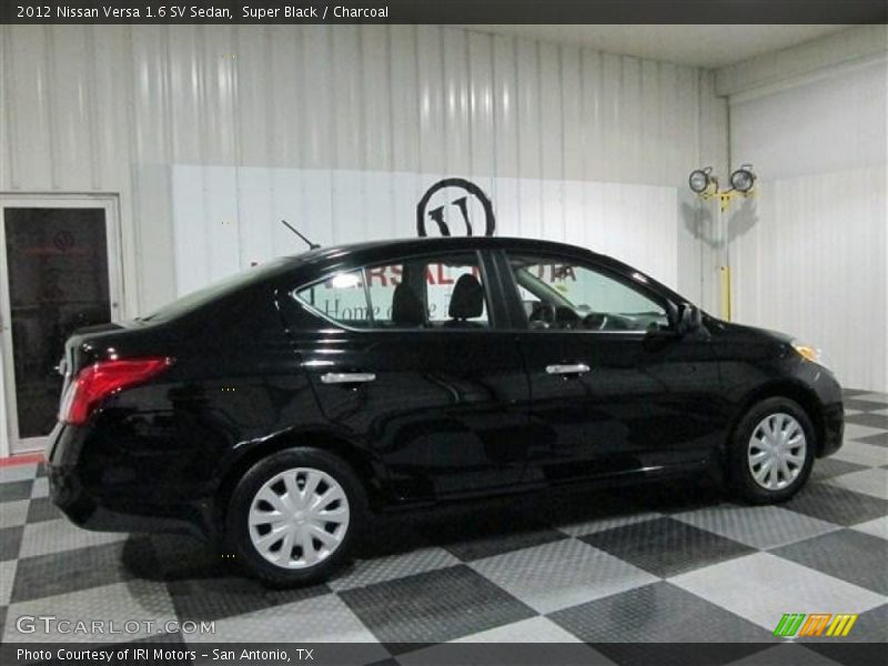Super Black / Charcoal 2012 Nissan Versa 1.6 SV Sedan