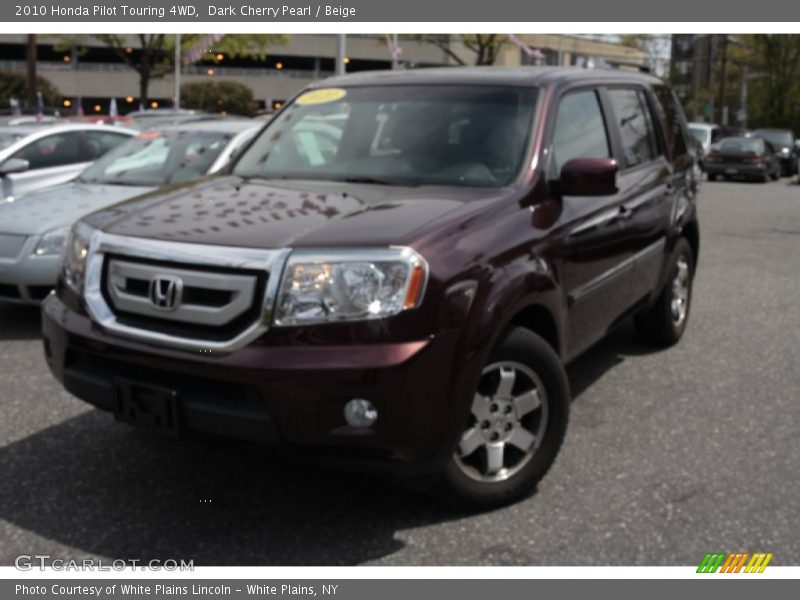 Dark Cherry Pearl / Beige 2010 Honda Pilot Touring 4WD
