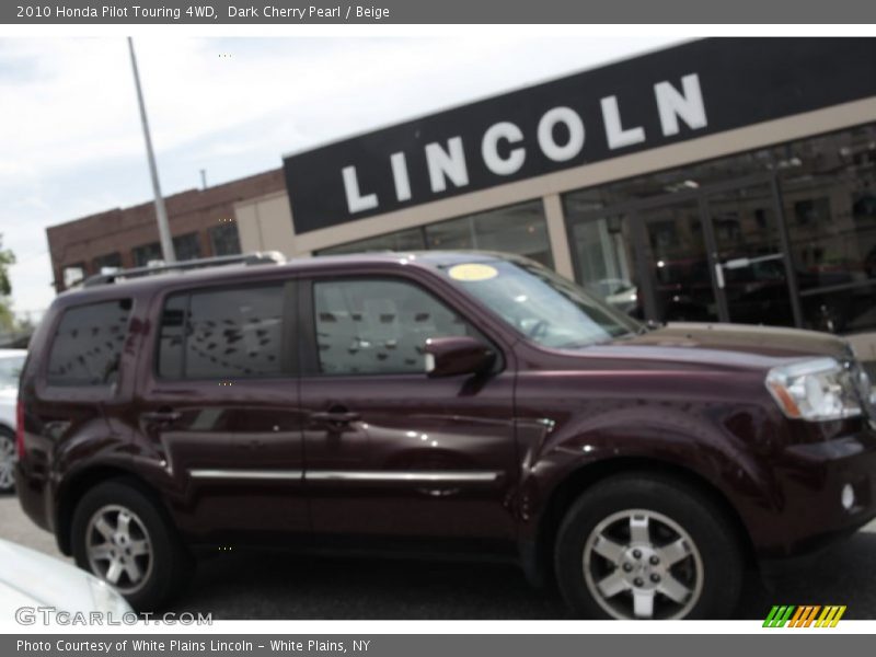 Dark Cherry Pearl / Beige 2010 Honda Pilot Touring 4WD