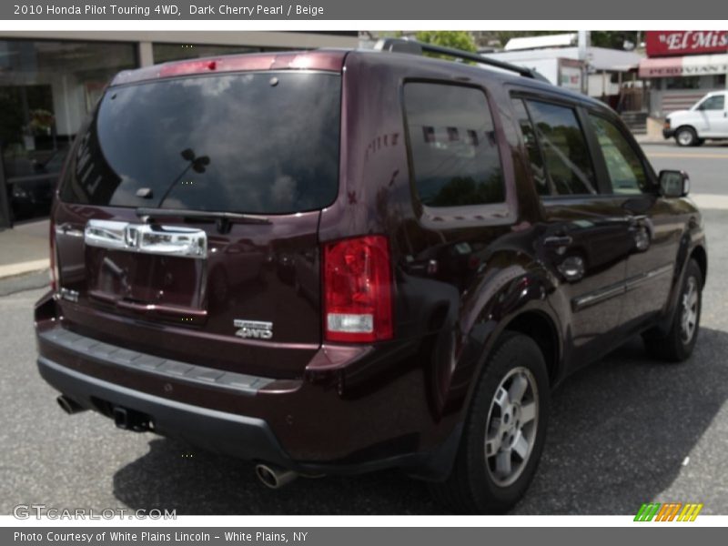 Dark Cherry Pearl / Beige 2010 Honda Pilot Touring 4WD