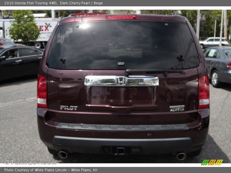 Dark Cherry Pearl / Beige 2010 Honda Pilot Touring 4WD