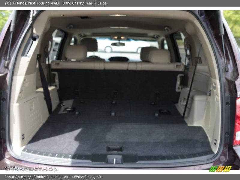 Dark Cherry Pearl / Beige 2010 Honda Pilot Touring 4WD