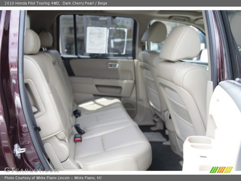 Dark Cherry Pearl / Beige 2010 Honda Pilot Touring 4WD