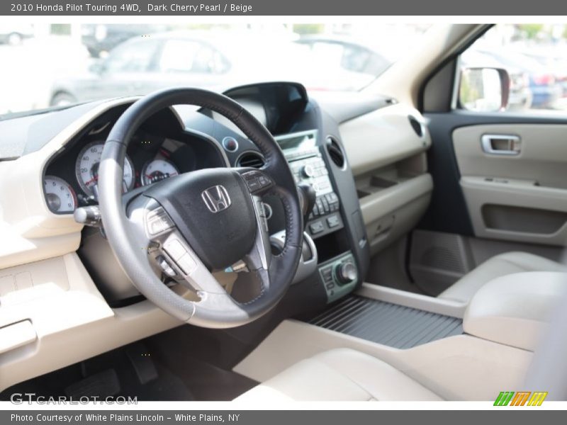 Dark Cherry Pearl / Beige 2010 Honda Pilot Touring 4WD