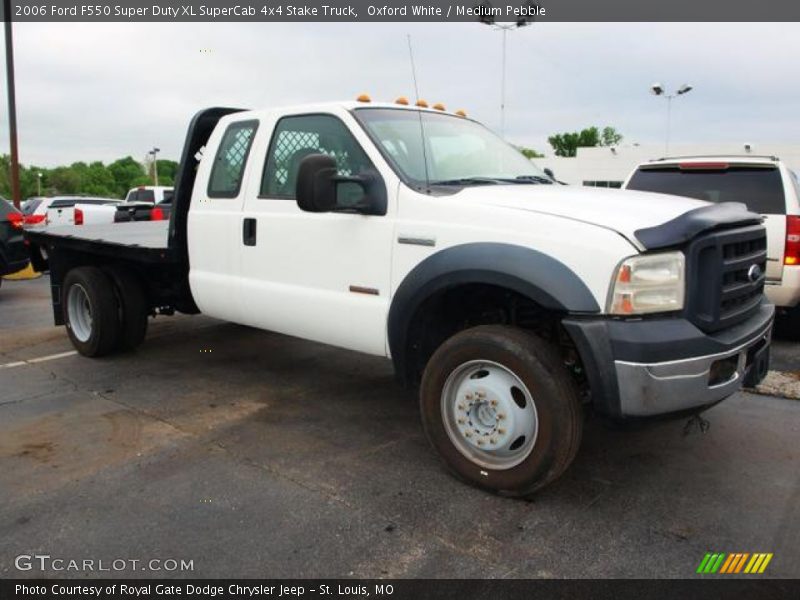 Front 3/4 View of 2006 F550 Super Duty XL SuperCab 4x4 Stake Truck