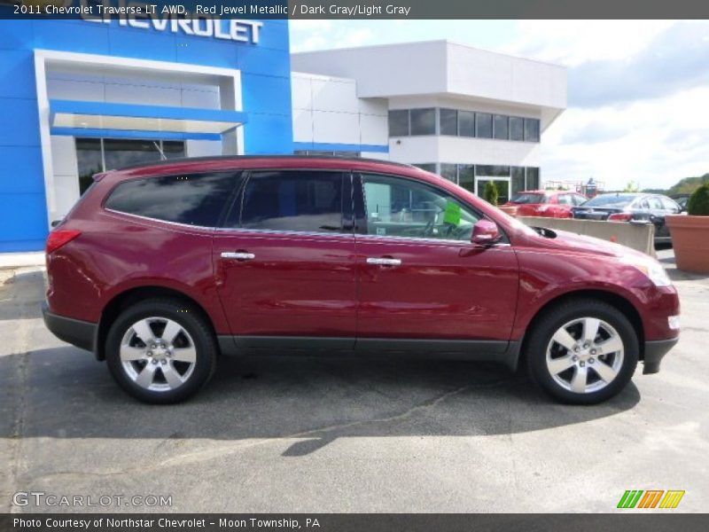 Red Jewel Metallic / Dark Gray/Light Gray 2011 Chevrolet Traverse LT AWD