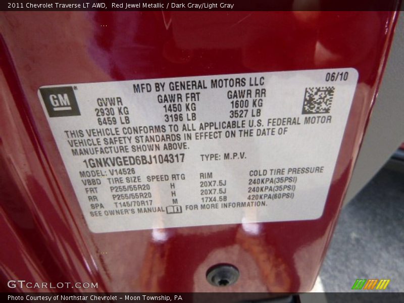 Red Jewel Metallic / Dark Gray/Light Gray 2011 Chevrolet Traverse LT AWD