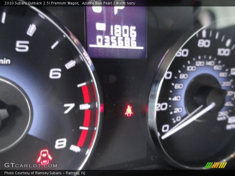 Azurite Blue Pearl / Warm Ivory 2010 Subaru Outback 2.5i Premium Wagon
