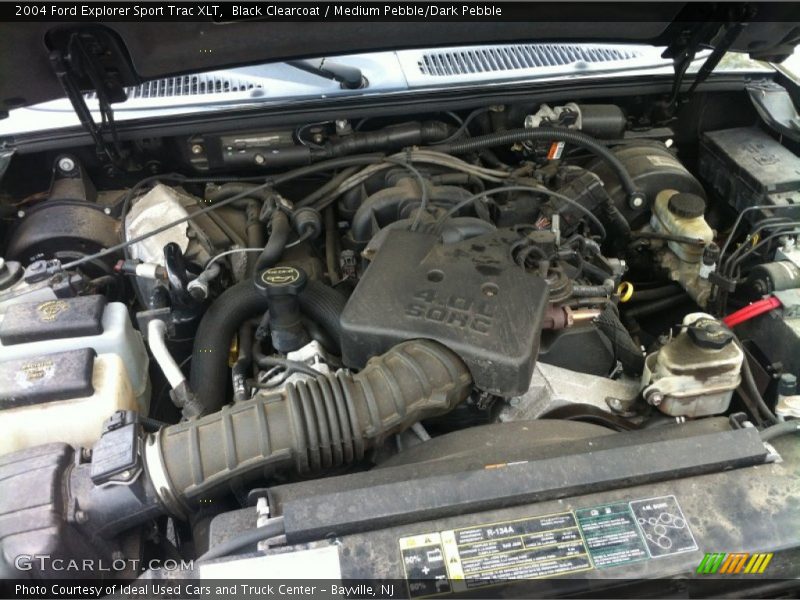 Black Clearcoat / Medium Pebble/Dark Pebble 2004 Ford Explorer Sport Trac XLT