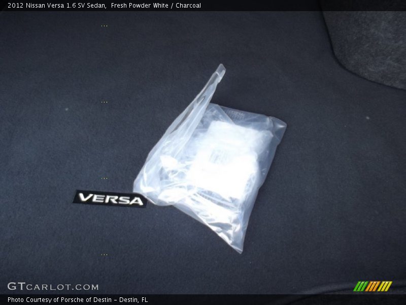 Fresh Powder White / Charcoal 2012 Nissan Versa 1.6 SV Sedan