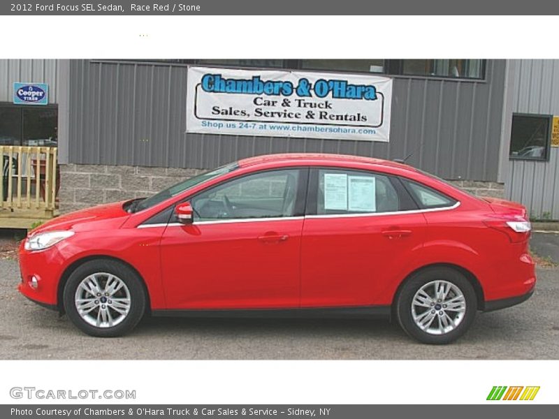 Race Red / Stone 2012 Ford Focus SEL Sedan