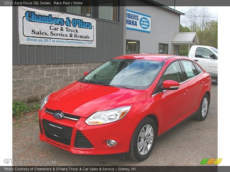Race Red / Stone 2012 Ford Focus SEL Sedan