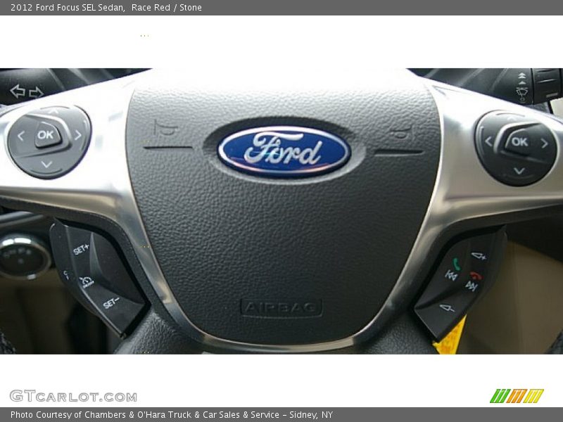 Race Red / Stone 2012 Ford Focus SEL Sedan