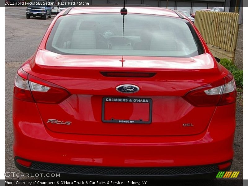 Race Red / Stone 2012 Ford Focus SEL Sedan