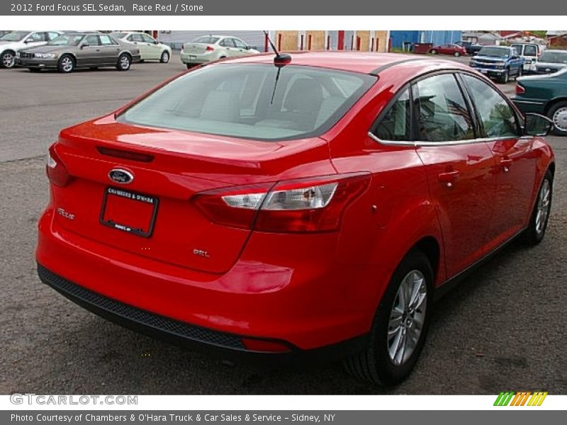 Race Red / Stone 2012 Ford Focus SEL Sedan