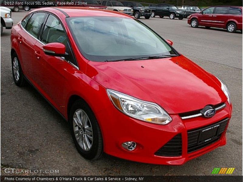Race Red / Stone 2012 Ford Focus SEL Sedan