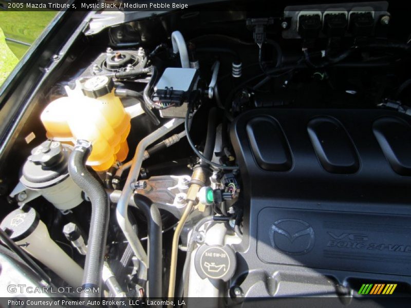 Mystic Black / Medium Pebble Beige 2005 Mazda Tribute s