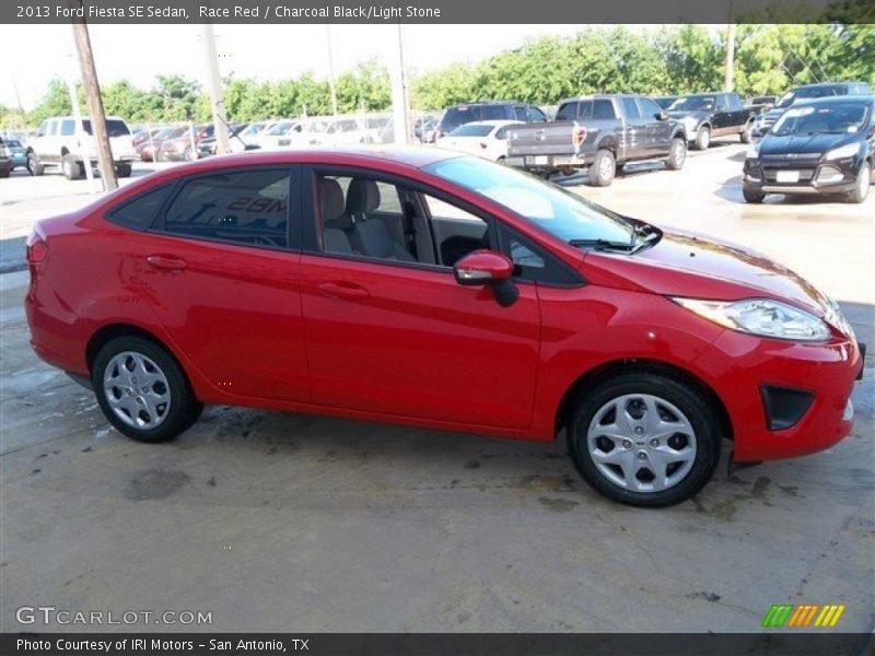 Race Red / Charcoal Black/Light Stone 2013 Ford Fiesta SE Sedan