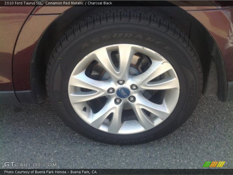 Cinnamon Red Metallic / Charcoal Black 2010 Ford Taurus SEL