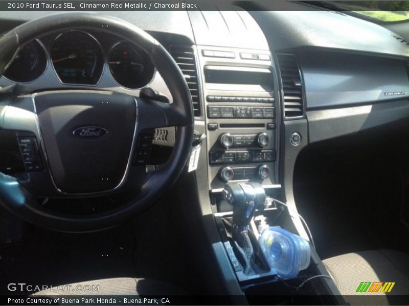 Cinnamon Red Metallic / Charcoal Black 2010 Ford Taurus SEL