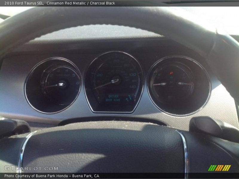 Cinnamon Red Metallic / Charcoal Black 2010 Ford Taurus SEL