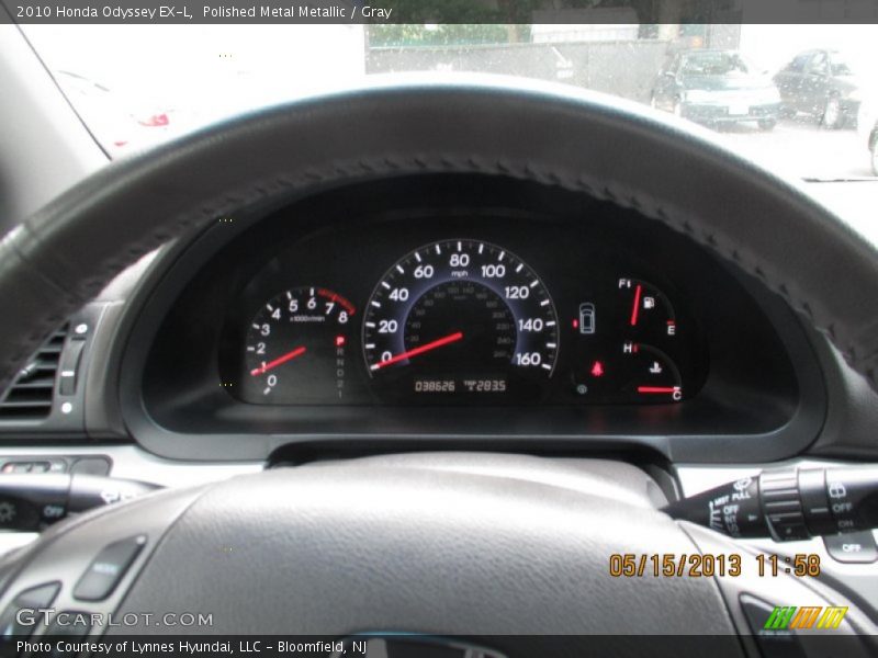 Polished Metal Metallic / Gray 2010 Honda Odyssey EX-L