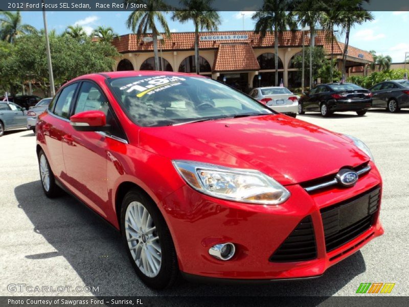 Race Red / Stone 2012 Ford Focus SEL Sedan