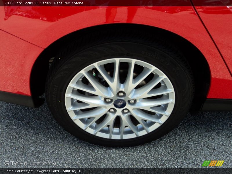 Race Red / Stone 2012 Ford Focus SEL Sedan