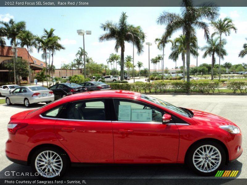 Race Red / Stone 2012 Ford Focus SEL Sedan