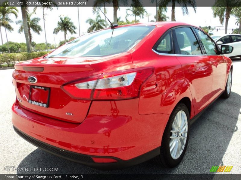 Race Red / Stone 2012 Ford Focus SEL Sedan