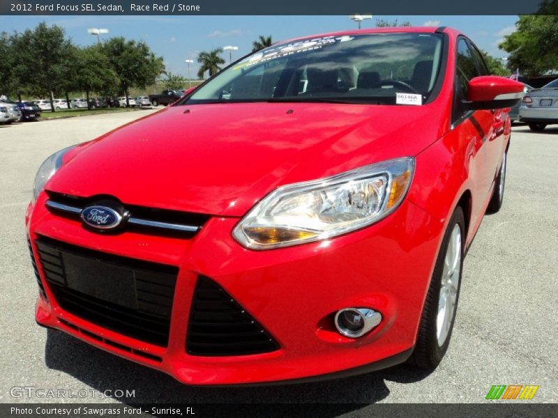Race Red / Stone 2012 Ford Focus SEL Sedan