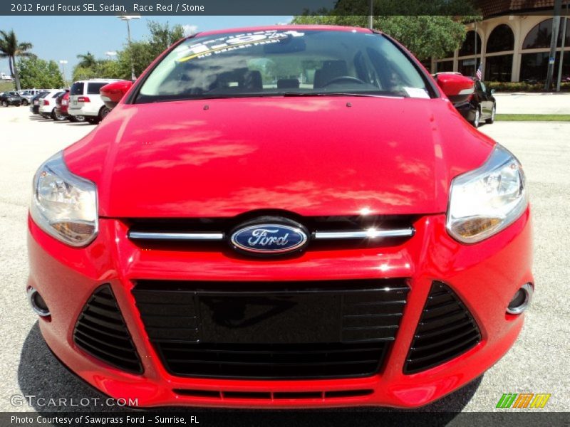 Race Red / Stone 2012 Ford Focus SEL Sedan