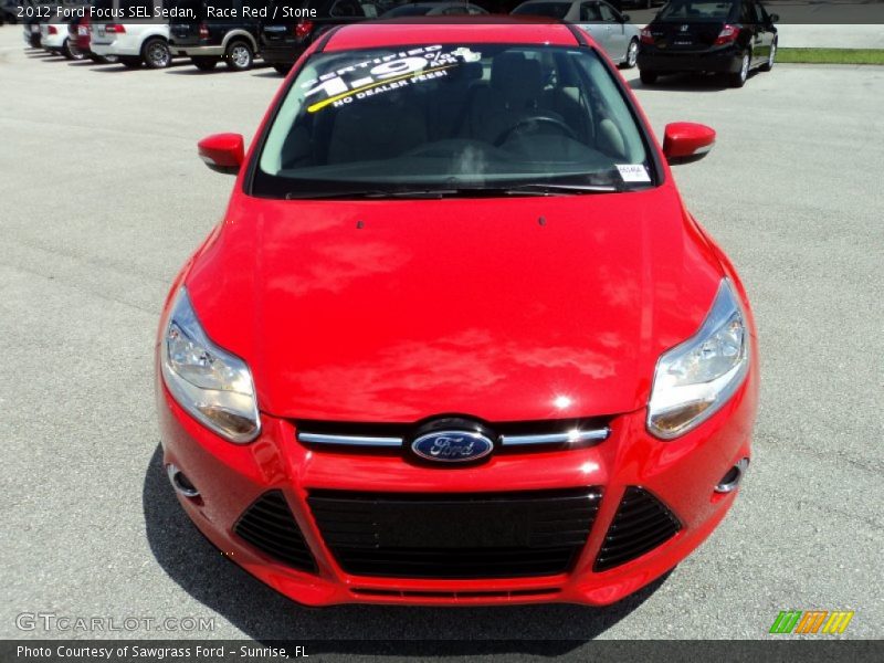 Race Red / Stone 2012 Ford Focus SEL Sedan