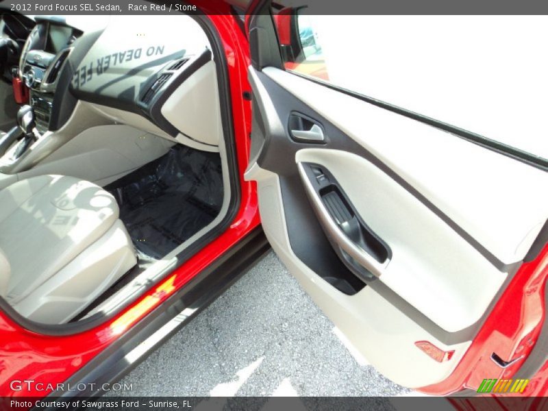 Race Red / Stone 2012 Ford Focus SEL Sedan
