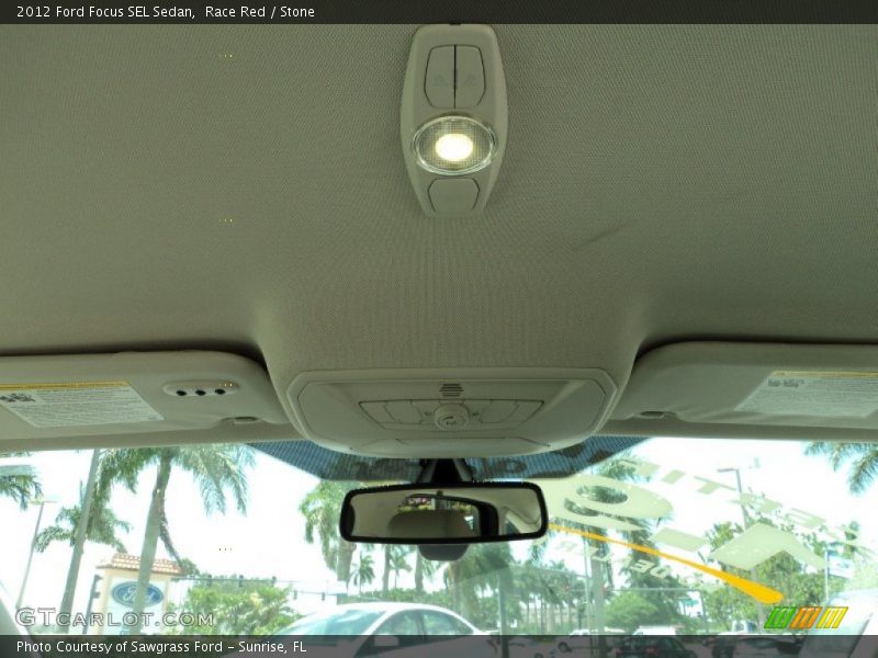 Race Red / Stone 2012 Ford Focus SEL Sedan