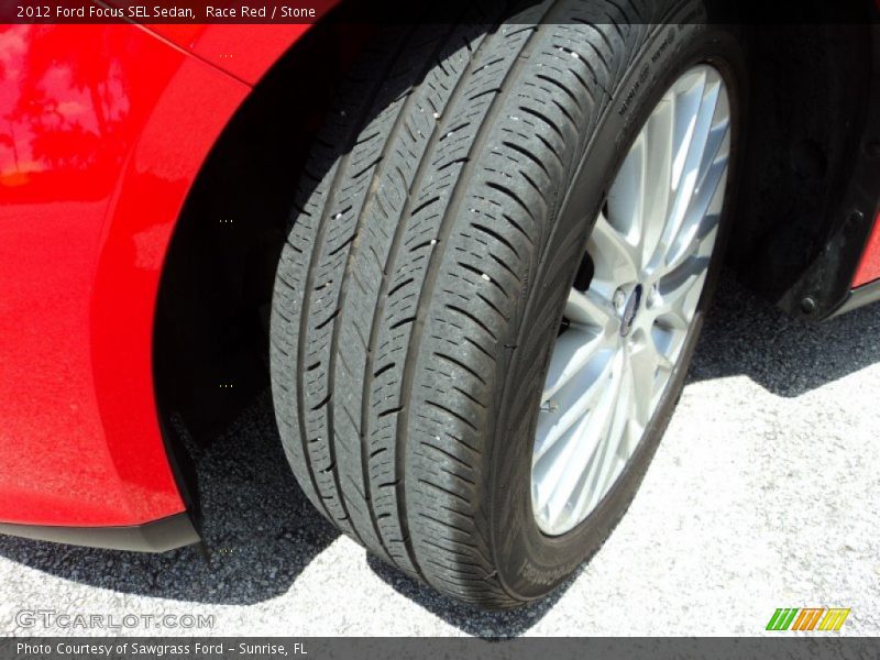 Race Red / Stone 2012 Ford Focus SEL Sedan
