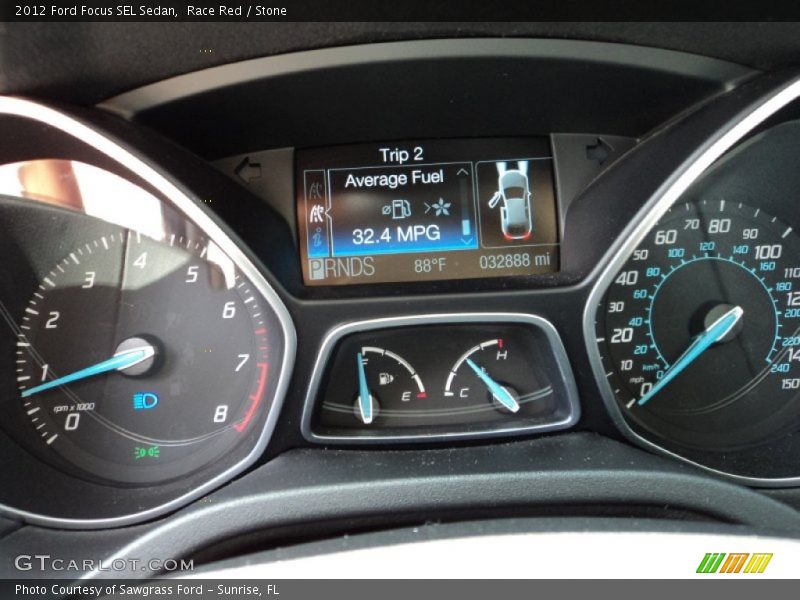 Race Red / Stone 2012 Ford Focus SEL Sedan