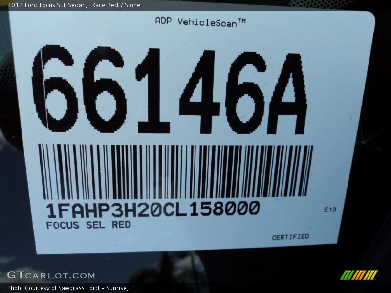 Race Red / Stone 2012 Ford Focus SEL Sedan