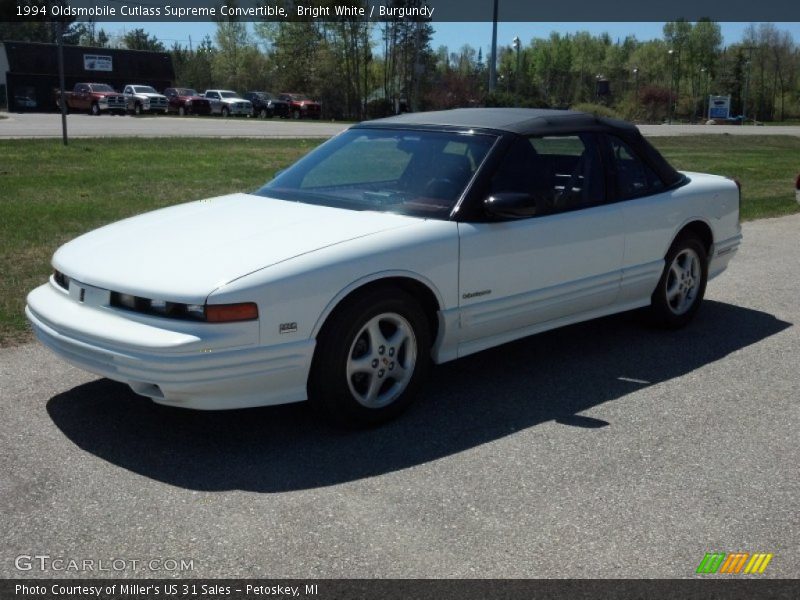 Bright White / Burgundy 1994 Oldsmobile Cutlass Supreme Convertible