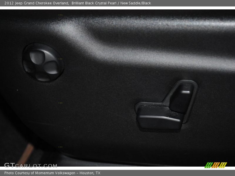 Brilliant Black Crystal Pearl / New Saddle/Black 2012 Jeep Grand Cherokee Overland